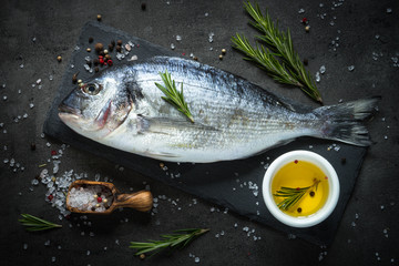 Dorado and ingredients for cooking