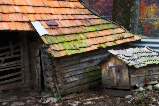 A fragment of an old wooden house of poverty, ruin, chaos