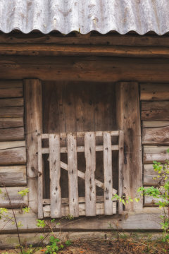 A fragment of an old wooden house door