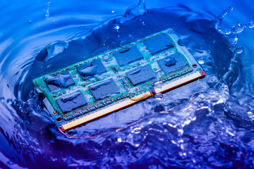 technology cyber electronic concept. cpu ram computer Fall into the water on blue light background....