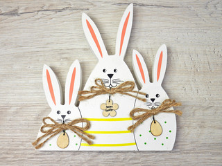 Bunny on wooden background for happy easter 