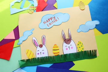 Happy Easter . Baby card with Easter bunnies. application of colored paper