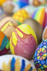 Detail of painted Easter eggs with different forms, cartoons and bright colors