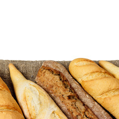 baguette of whole wheat bread on a white background