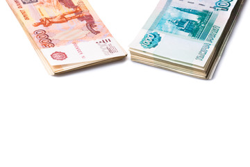 Pack of one and five thousand roubles banknotes isolated on white background