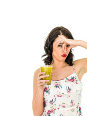 Woman Holding A Glass Of A Fresh Fruit Smoothie Showing Her Dislike