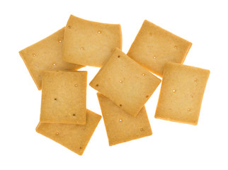 Top view of several hard bread crackers isolated on a white background.