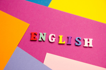 English word composed from colorful abc alphabet block wooden letters, copy space for ad text. Education concept.