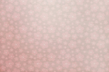 Soft pink sakura spring background with soft stone texture behind - flowers, cherry blossom