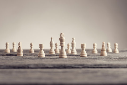 Retro image of white chess pieces