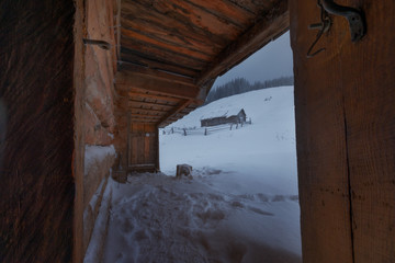 The wooden house is winter
