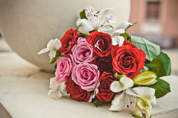 Bridal bouquet and wedding ring