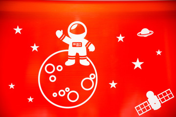 schematic representation of Astronaut spaceman outer space planet saturn earth sun universe.