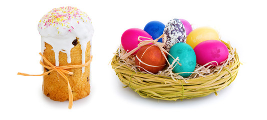 Easter eggs in the wicker basket and cake .