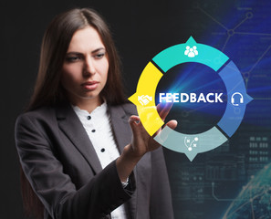 The concept of business, technology, the Internet and the network. A young entrepreneur working on a virtual screen of the future and sees the inscription: Feedback