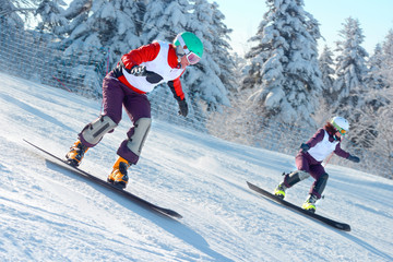 Fototapeta na wymiar Snowboard racing slalom, winter sports