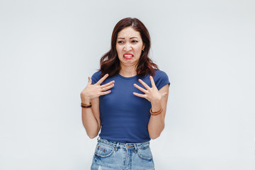 Emotion of disgusted woman isolated on white