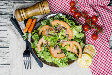 raw fish salad and vegetables fruit