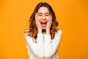 Excited screaming young woman