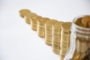 Gold coins lined up in rows. Business idea.