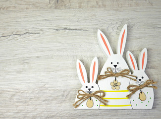 Three Bunny on wooden background for happy easter  - obrazy, fototapety, plakaty