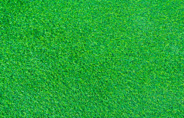 Fototapeta premium short green turf for house decoration, fake plastic grass background and texture