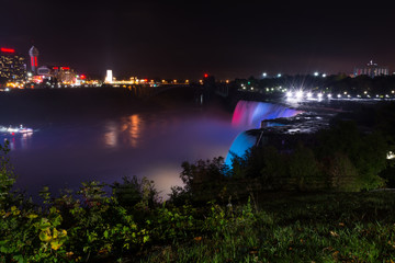 Fototapeta na wymiar Night view of NIagara falls on USA side. Niagara falls night show.