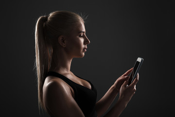 Portrait of a healthy fitness woman dressed in sportswear