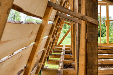 Fototapeta na wymiar wooden house under construction