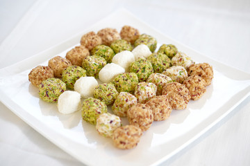 Delicious pralines in a dish