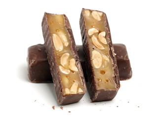 chocolate toffee with peanut filling isolated on white background