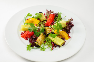 Vegetable dish with pomegranate seeds