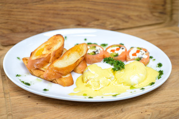 High cuisine, feta with sauce, salmon snack and toast