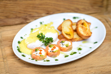 Fototapeta na wymiar Elegant dish with feta cheese sauce and salmon snack
