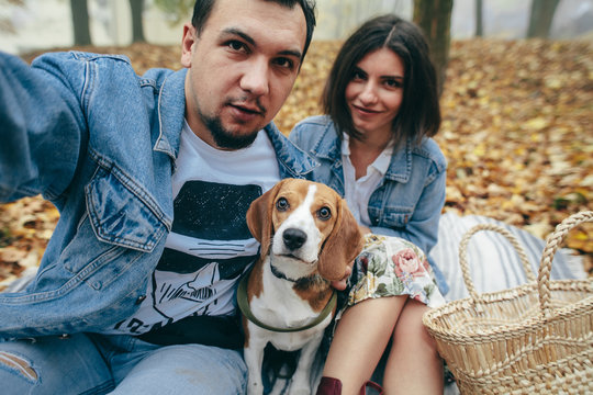 Couple with dog family beagle