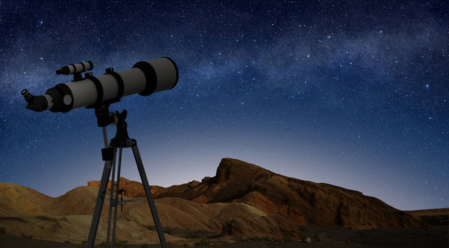 telescope on a tripod pointing at starry night sky