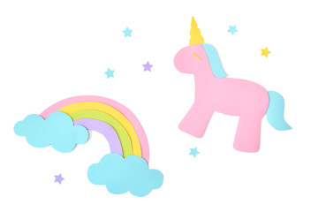 Unicorn and rainbow paper cut on white background - isolated