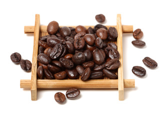 Coffee beans isolated in basket on white background 