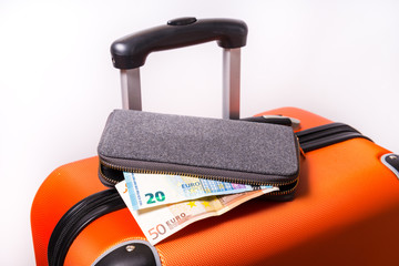 Wallet with Euro and suitcase, Save money for travel concept