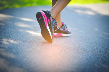 Naklejka premium Jogging with sport shoes on holiday