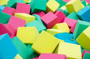 Soft foam cubes. The concept of children's holiday. Background. Texture