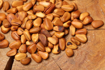 Pine nuts on white background