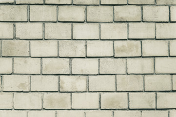 Old grey stone brick wall background