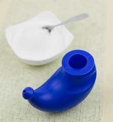 Device for washing the nose. Near the sea salt for the preparation of a solution for washing.