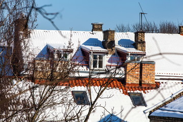 Fototapeta na wymiar Old Town Roofs in Winter