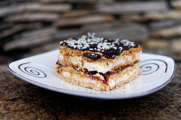 Typical polish cake called Mazurek on the wooden stamp