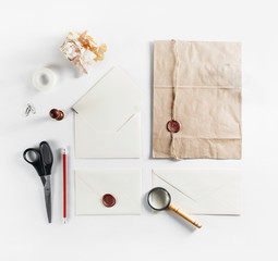 Photo of blank vintage stationery set on paper background. ID template. Mock up for branding...