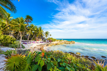 Recreation at paradise beach resort with turquoise waters of Caribbean Sea at Tulum, close to...
