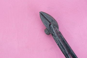 tools on a pink background
