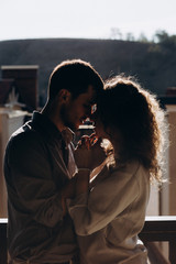 Evening photo session of a beautiful young couple.